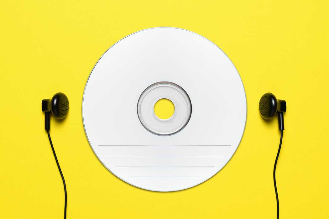 blank-cd-and-headphones-on-yellow-background-2021-08-26-15-35-24-utc.jpg